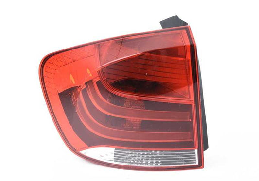 Left side taillight for BMW E84 (OEM 63212990111). Original BMW