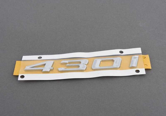 Emblem pour la série BMW 4 F32, F33, F36 (OEM 51147423948). BMW d'origine