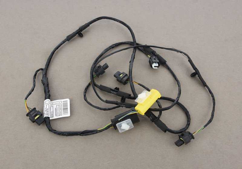 Juego de cables PDC delantero para BMW E89 (OEM 61129275116). Original BMW.