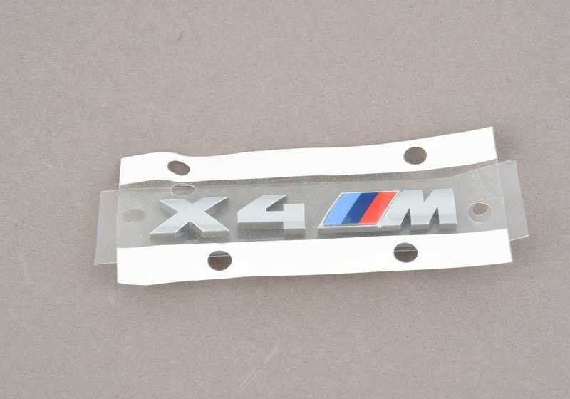 Emblema de rejilla frontal izquierda OEM 51118082586 para BMW F98 (X4 M). Original BMW.