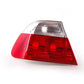 White left side taillight for BMW 3 Series E46 (OEM 63218383825). Original BMW.