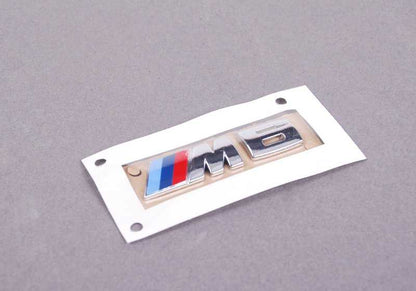 Etiqueta emblema logo  - M6 - para la rejilla riñonera delantera para BMW M6 f12 f13 f06 . Original BMW