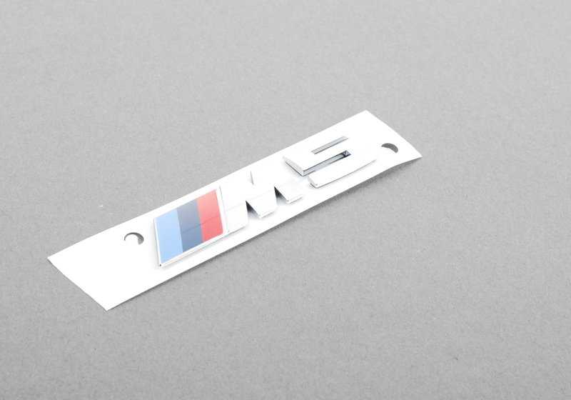 Emblem for various BMW models/series (OEM 51138059945). Genuine BMW.