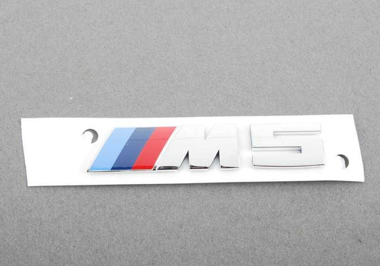 Emblem for various BMW models/series (OEM 51138059945). Genuine BMW.