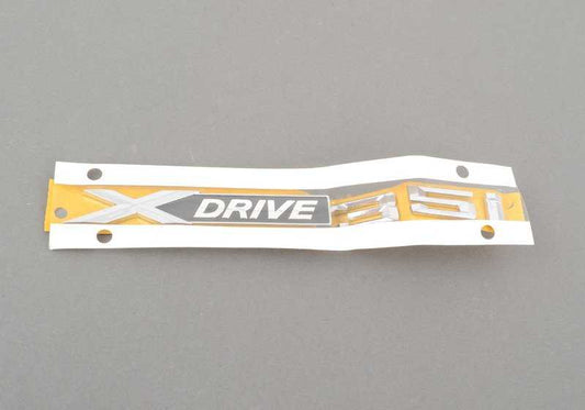 Emblem "XDrive" OEM 51147362495 for BMW E84, F25, F26, E70. Original BMW.