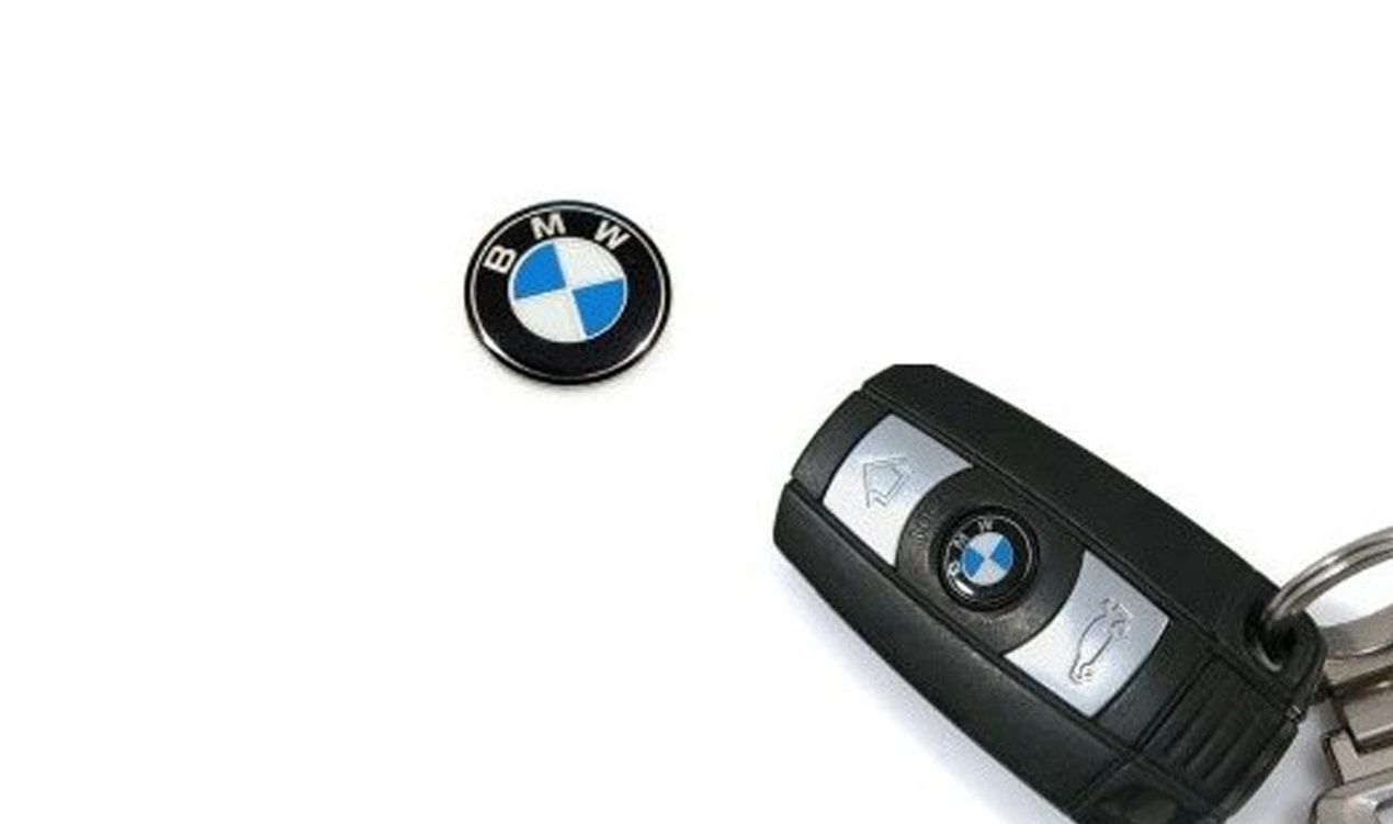 Emblema para llave OEM 66122155754 para BMW (Modelos compatibles: E81, E82, E87, E88, E90, E91, E60, E61, E63, E64). Original BMW.